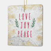 Liefde vreugde kerstbloemen op marmer keramisch ornament (Links)
