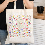 Liefde Winkelen en Bloemen Kleurrijke Wildflower Tote Bag<br><div class="desc">Canvas tas geletterd met grillige handgeschreven tekst en versierd met kleurrijke wilde bloemen. "Ik hou van winkelen bloemen" is volledig bewerkbaar, als je de formulering wilt aanpassen. Het ontwerp is aan beide zijden bedrukt met een bloemenpatroon van weidewilde waterverven. Blader door mijn Moederdag Wildflower Collectie voor meer bloemrijke kaarten en...</div>