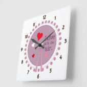 Liefde zit in de luchtmuur klok (Hoek)