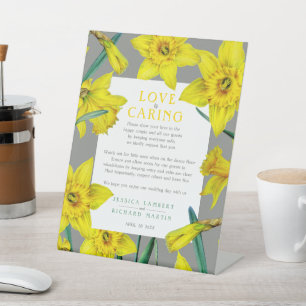 Liefde zorgt voor een geel veer bruiloft-gezondhei reclamebord met voetstuk