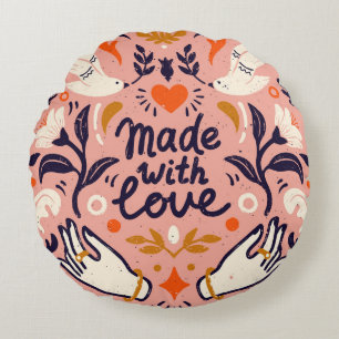 Liefdeselementen: roze compositie. rond kussen