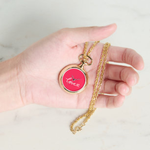 Liefhebber van witte tekst op roze horloge
