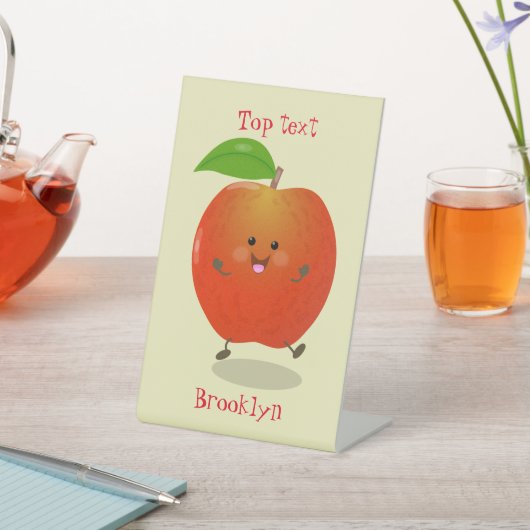 Lieve dansende appel cartoon illustratie reclamebord met voetstuk (Insitu)