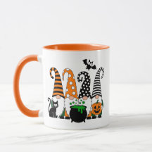 Lieve Halloween-kabouters met ketel en pompoen