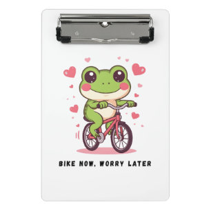 Lieve kikker die op een fiets rijdt Grappig gesc Mini Klembord