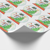 Lieve sneeuwman in een sneeuwbol met kerstboom cadeaupapier (Hoek)