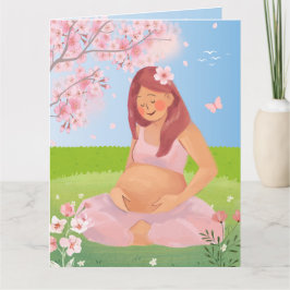 Lieve zwangere moeder in pastelkleuren in de natuu kaart