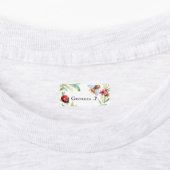 lieveheersbeestje | Kleding die aan een kledingstu Labels (Aangebracht)