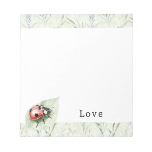 Lieveheersbeestje op blad liefde notitieblok