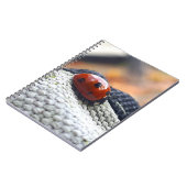 Lieveheersbeestje symbool tegen geweld. notitieboek (Linkerzijde)