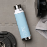 Light Blue Modern Typography Personalized Waterfles<br><div class="desc">Trendy, vacuum insulated water bottle that features personalized name in white, modern typography on a light blue color background. Personalize bottle by editing name and replacing name with your own as desired. Perfect for a birthday gift, wedding groomsman gift, etc. Select your water bottle style. Available in many, trendy color...</div>