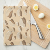 Light colored pebbles scattered on sand theedoek (Quarter Fold)