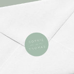 Light Sage Wedding Ronde Sticker<br><div class="desc">Deze bruiloft sticker heeft de namen van het bruidspaar in wit tegen een lichte salie kleur achtergrond. Bekijk andere bijpassende huwelijksartikelen https://www.zazzle.com/collections/peach_layered_geometric_light_sage_wedding-119919264900833968?rf=238364477188679314&tc=rc . Personaliseer het door de plaatsaanduidingstekst te vervangen. Voor meer opties zoals om het lettertype te wijzigen, het is grootte en ruimte tussen letters klik op de knop "Aanpassen"....</div>