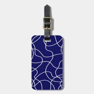 Lijnkunst: wit op donkerblauw bagagelabel