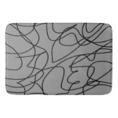 Lijnkunst: zwart op grijs badmat (Voorkant)