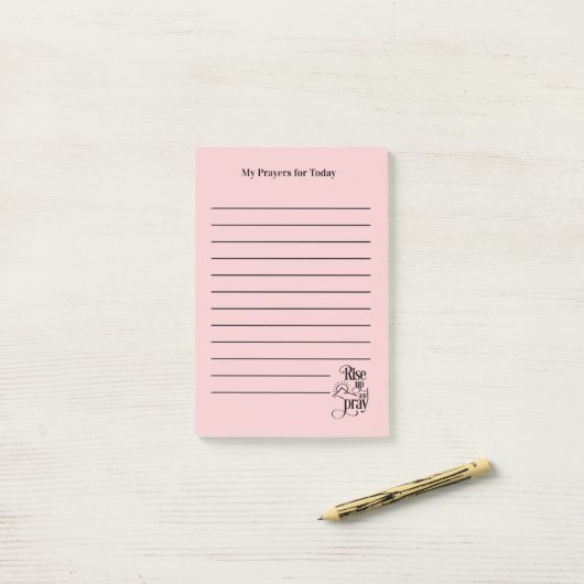 Lijst met roze en roze roze gebeden post-it® notes (Op bureau)