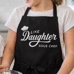 Like Daughter Sous Chef Typography Design Schort<br><div class="desc">This design features a playful white cooking quote on a bold black background, highlighted with elegant script lettering and a small chef hat icon. The phrase “Like Daughter Sous Chef” gives it a fun family-and-kitchen theme that stands out with clean, high-contrast styling. Its mix of flowing typography and simple layout...</div>