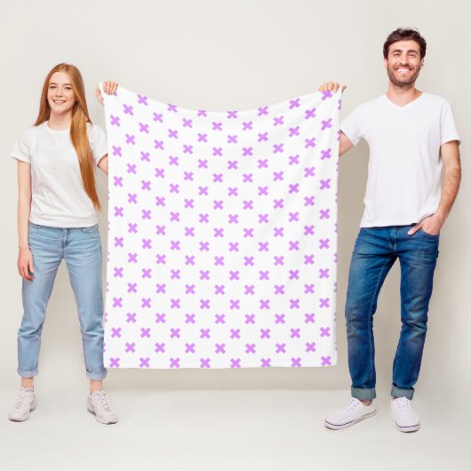 Lila kruisstiften op wit fleece deken (In situ)