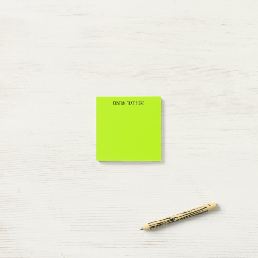 Lime groen post-it® notes (Op bureau)