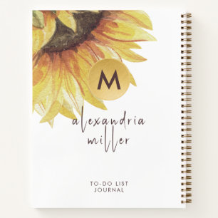 Linkerhandbediende zonnebloemmonogram naar-do lijs notitieboek