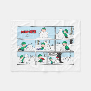 Linus bouwt een sneeuwpop fleece deken