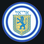 Lion Judah Emblem Ariel Hebrew Sticker<br><div class="desc">Ronde sticker met een afbeelding van een blauwe en gele lion van het Judah-embleem met Ariel in het Hebreeuws bovenaan, en brede dubbele blauwe randen in lichtblauw getrimd op wit. Zie overeenkomend confetti-, label- en verpakkingspapier. Zie het gehele collectie Hanukkah Sticker onder de categorie CARDS & STICKERS in de sectie...</div>