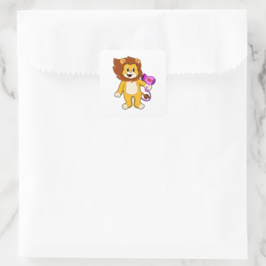 Lion met haardroger vierkante sticker (Tas)