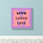 LIVE LACHEN LIEFDE MONOGRAM stretched canvas Print (Insitu (Houten vloer))