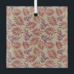 Lively Red and Purple Leaf Motifs on Neutral Beige Glas Ornament<br><div class="desc">Pattern of red and purple leaf designs on a beige background. The bold,  intricate leaves create a lively and dynamic contrast,  evoking a tropical feel.</div>