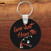Livin’ net boven de E Sleutelhanger (Voorkant)