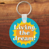Living the dream keychain with sunny logo (Voorkant)