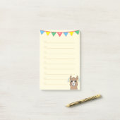 Llama en meerkleurige linten op ivoorzijde post-it® notes (Op bureau)