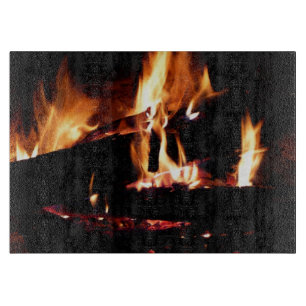 Logboeken in de vuurfoto van de Fireplace Snijplank