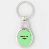 Logo met lichtgroene achtergrond op ovaal metaal sleutelhanger (Voorkant)