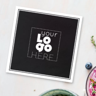 logo van het witboek op de zwarte papierpartij nap servet