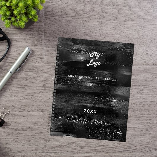Logo van zwarte elegante monogram planner