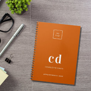 Logo verbrand oranje monogram beginletters bedrijf notitieboek