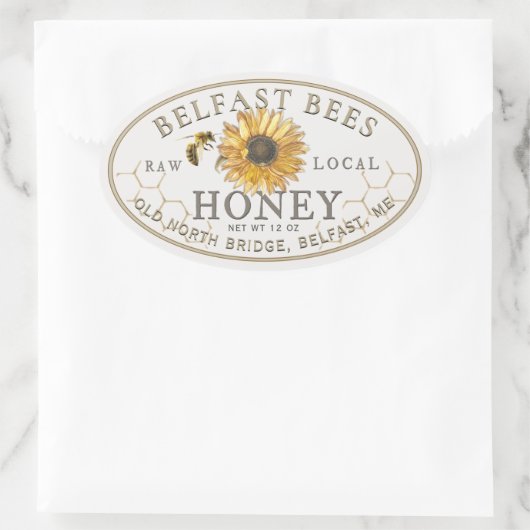 Lokale honing met zonnebloem en bijen ovale sticker (Tas)