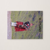 Lone Scottish bagpiper, Highlands, Schotland Legpuzzel (Horizontaal)