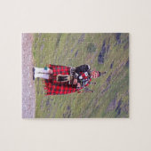 Lone Scottish bagpiper, Highlands, Schotland Legpuzzel (Horizontaal)