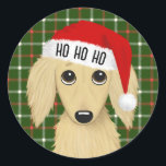Longhaired Cream Dachshund Santa Dog Christmas Ronde Sticker<br><div class="desc">Verspreid feestvreugde met deze schattige kerstteckel sticker! De sticker heeft een langharige Engelse crèmekleurige teckel met een felrode kerstmuts met witte rand. HO HO HO HO kan worden gepersonaliseerd met naam of andere tekst. Deze peel-and-stick stickers kunnen worden gebruikt om enveloppen of verpakkingen voor de feestdagen op een leuke en...</div>