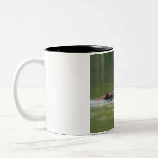 Loon met Mok van kookkoffie (Links)