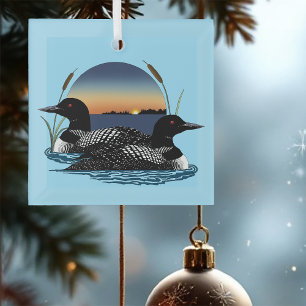 Loon paar zonsondergang blauw glas ornament