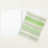 Loopard-afdruk op gestreepte achtergrond. planner (Display)