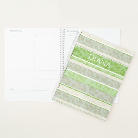 Loopard-afdruk op gestreepte achtergrond. planner (Display)
