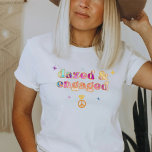 LORI Tie Dye Dazed en Bachelorette T-shirt<br><div class="desc">Dit verbijide en geëngageerde bachelorette aan shirt is voorzien van groovy 70s themed tie dye en een retro bubble font. Bestel de witte "gedempt en betrokken"optie voor de bruid-aan-zijn en de coördinerende "gebooste en verwarde"shirten voor uw bacheloretgroep.</div>