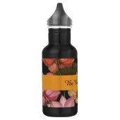 Lotus Water Lilies bloeien op zwarte houtskool Waterfles (Links)