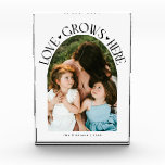 Love Grows Here Modern Arch White Fotoblokken<br><div class="desc">Modern and minimal family memory photo block featuring a photo in a arch frame with a text that says "Love Grows Here" with tiny hearts. White.</div>