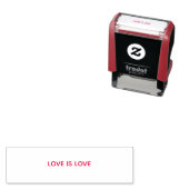 LOVE IS LOVE stempel met rode inkt (In situ)