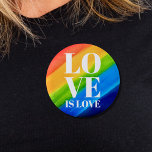 Love Pride Rainbow Ronde Button 5,7 Cm<br><div class="desc">Deze Pride Button is versierd met LOVE IS LOVE in vetgedrukte witte letters op een waterverf regenboogachtergrond van rood,  oranje,  geel,  groen,  blauw en paars. Oorspronkelijke Waterverf © Michele Davies.</div>